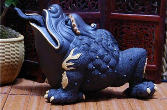 做生意的金蟾頭朝里還是朝外