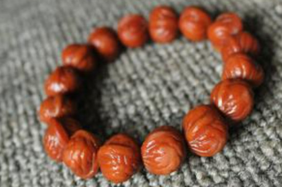 野生桃核手串怎么盤紅