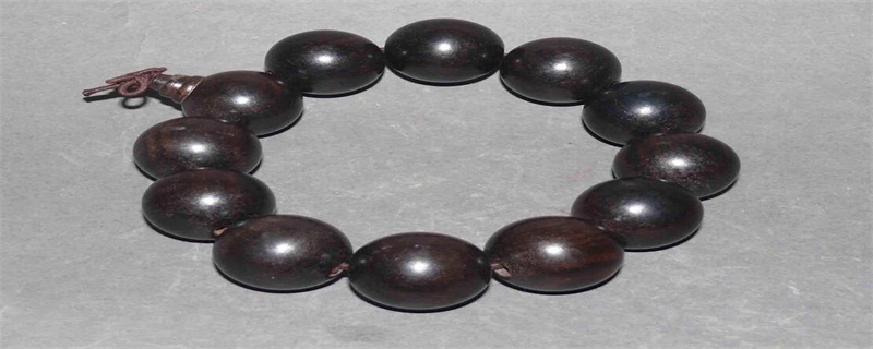 紫光檀手串如何盤玩