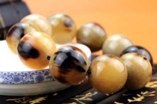 怎么判斷手串是牛角還是塑料