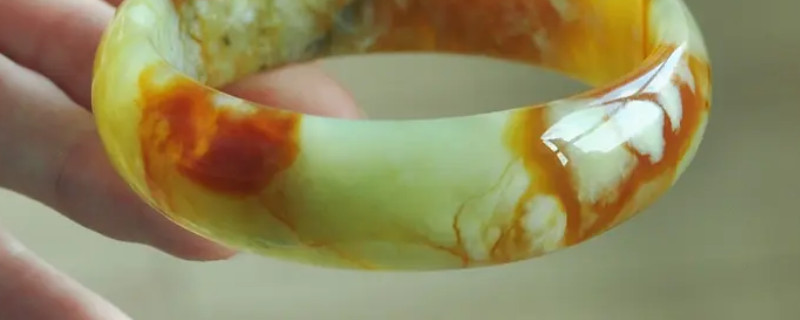 岫玉花玉能盤紅嗎