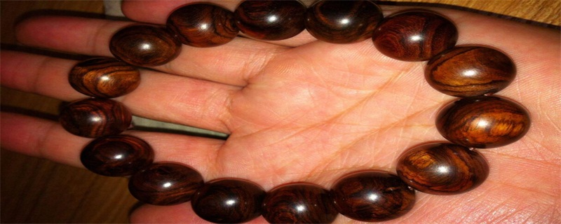 女人戴黃花梨手串好處