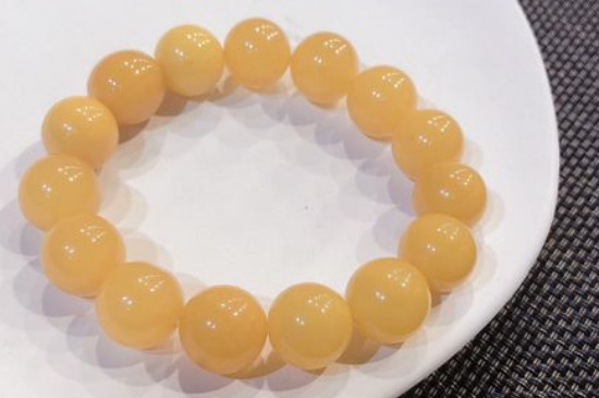 新買的蜜蠟手串怎么盤