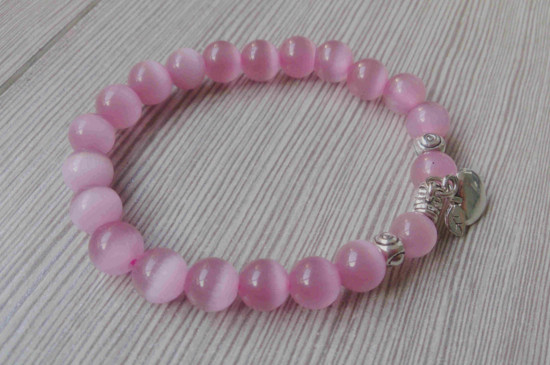 粉色貓眼石寓意,粉色貓眼石的象征意義