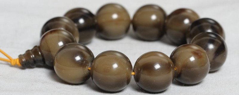 怎么判斷手串是牛角還是塑料